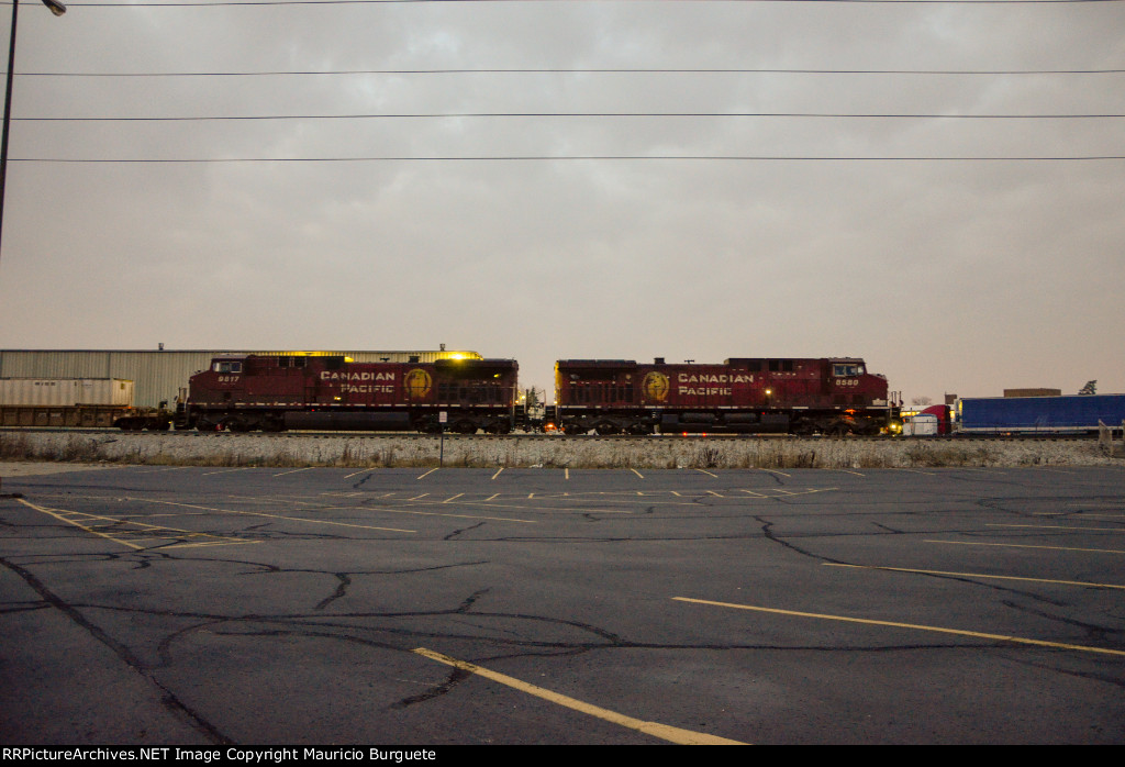 CP AC44CW Locomotives leading a train